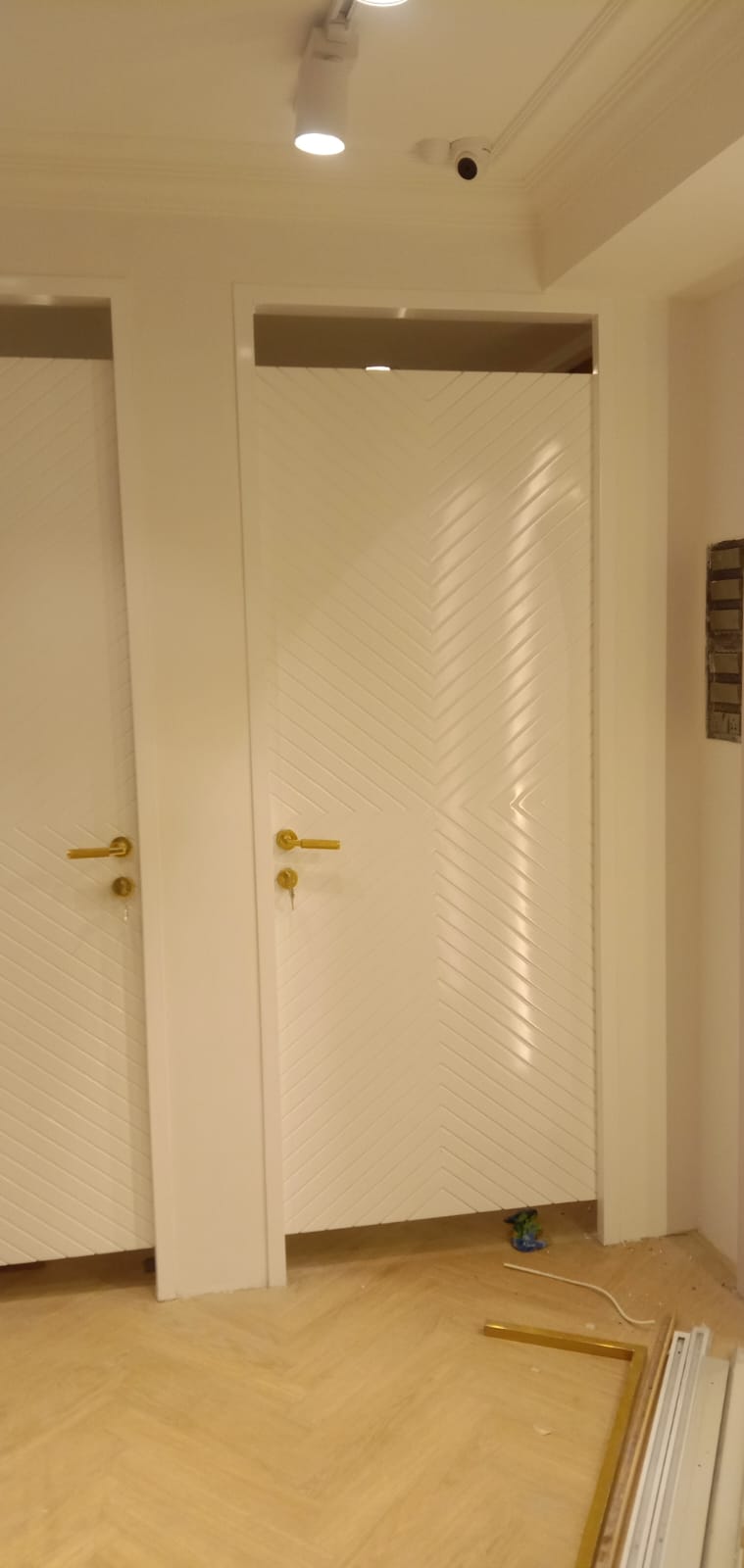 Bespoke Chevron Grooved Doors with Brushed Brass